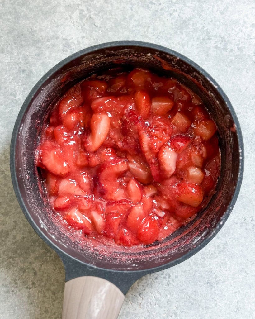 Strawberry pie filling in a pot. 