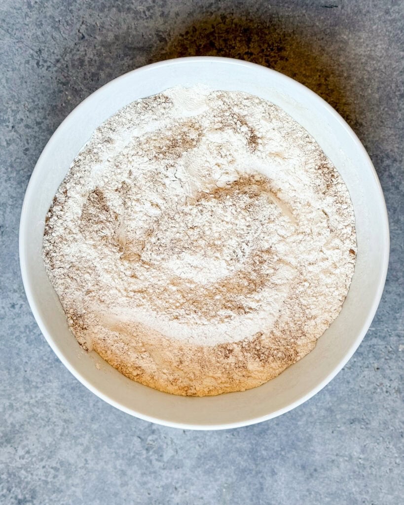 Flour mixed with cinnamon in a bowl.