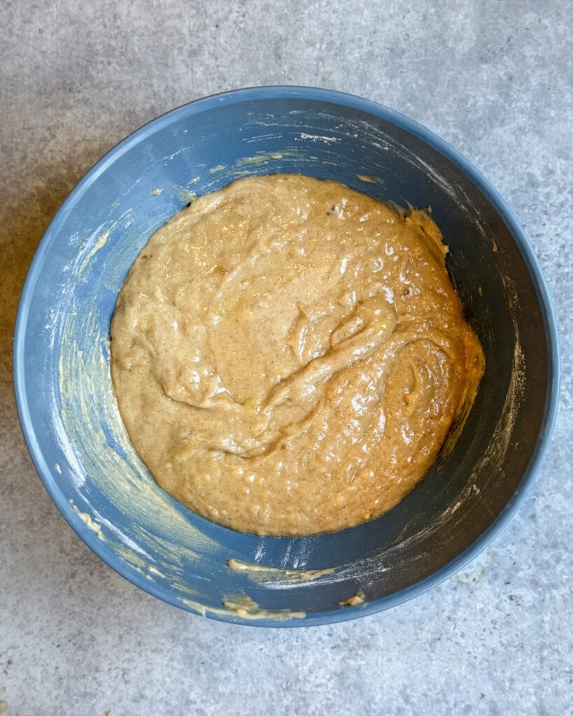 Banana bread batter in a bowl.