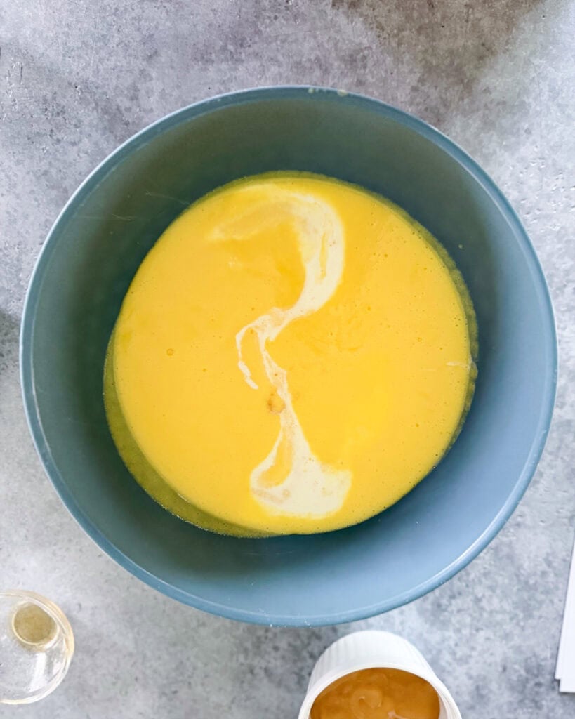 Liquid Lemon cream pie ice cream in a large bowl, cooling down.
