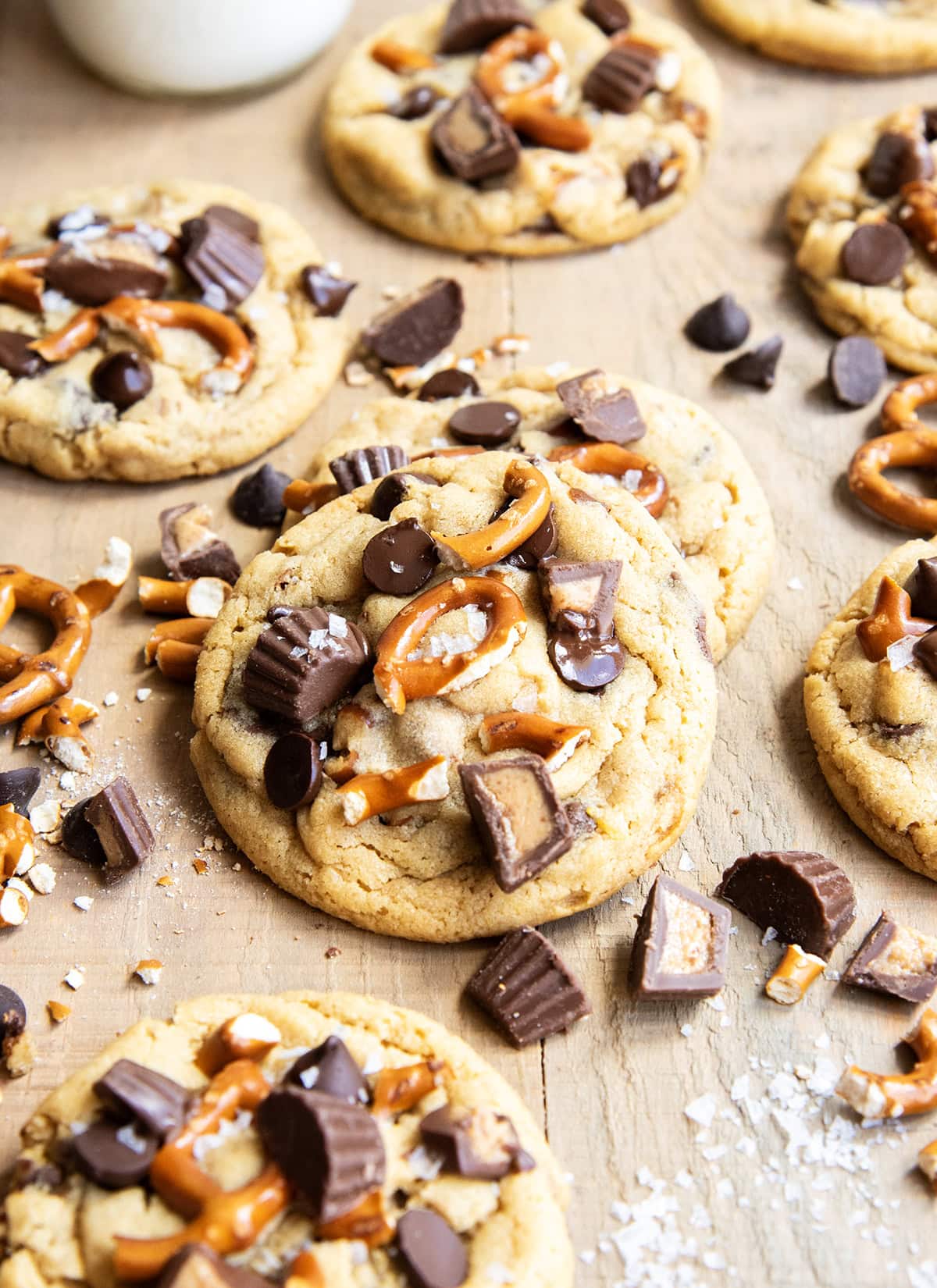 Peanut Butter Pretzel cookies topped with chocolate chips, peanut butter cups, and mini pretzels.