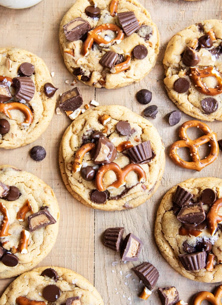 Peanut Butter Pretzel cookies topped with chocolate chips, peanut butter cups, and mini pretzels.