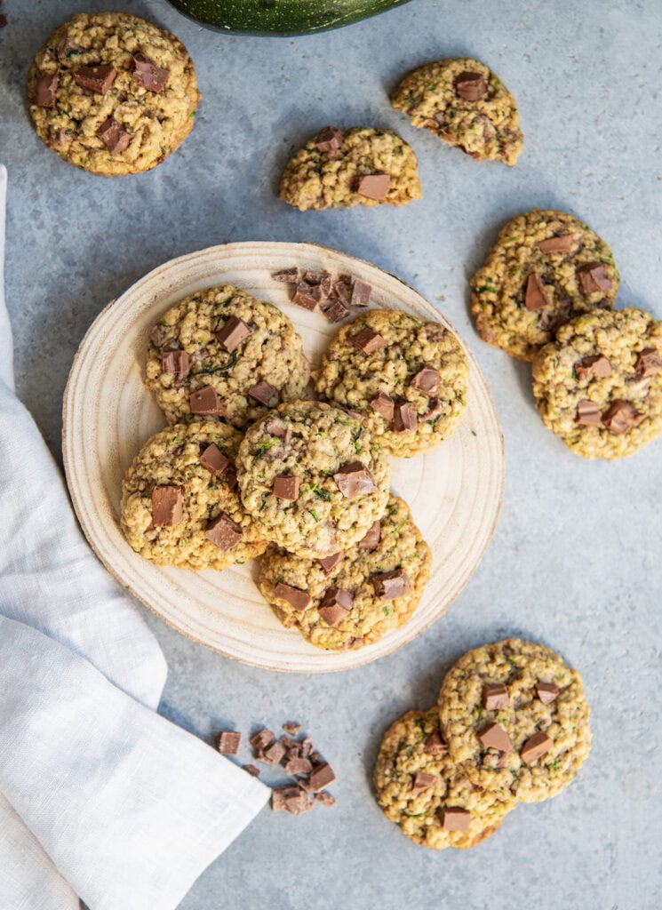 A plate of four Oatmeal Zucchini Chocolate Chip Cookies.